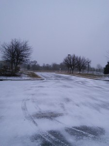 Cold, Grey, and Snowy parking lot.